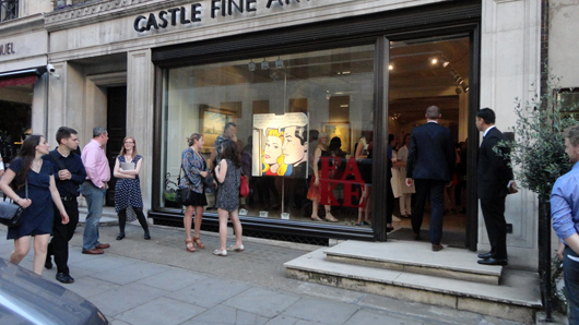 Guests spilled onto the pavement at Castle Fine Art’s oversubscribed opening night as punters flocked to see John Myatt’s fake masterpieces on July 17. Image Auction Central News.